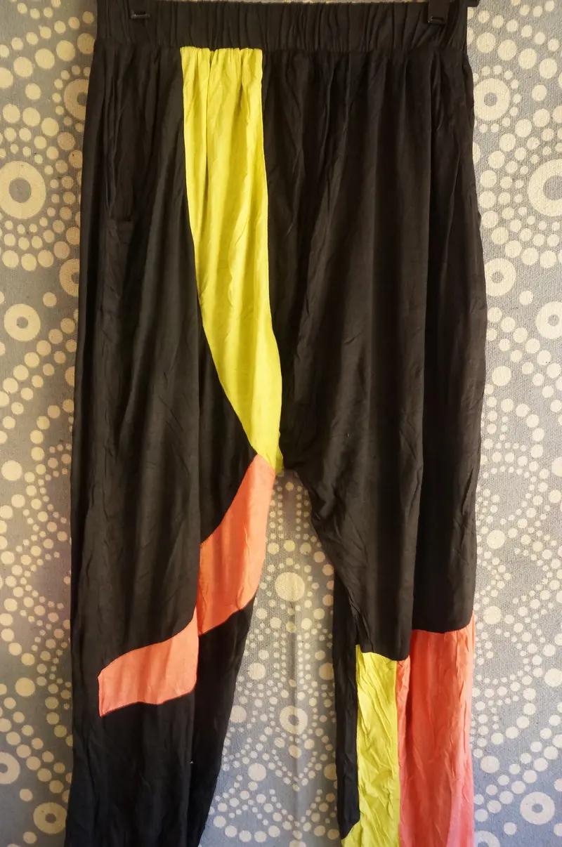 Black Flowy Wide-Leg Pants With Pink And Yellow Accents 1