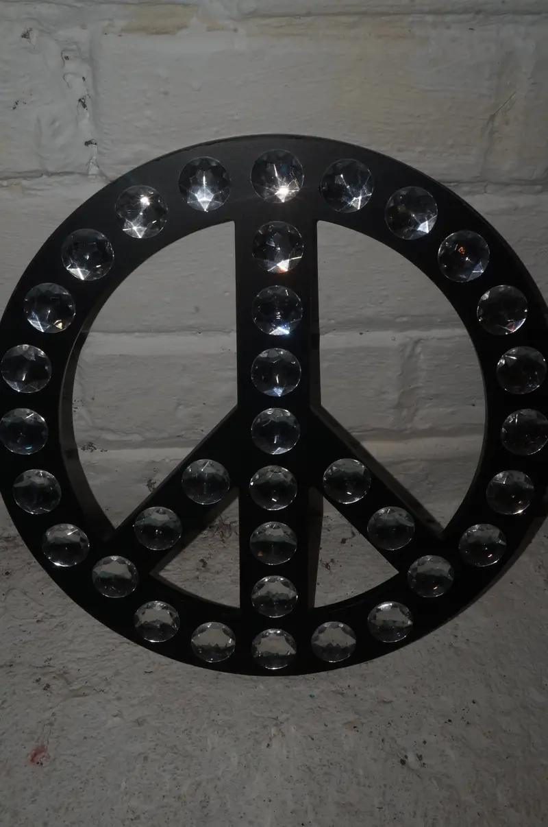Diamond-Encrusted Peace Symbol Pendant 1